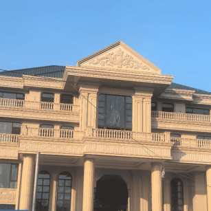 六安黄金麻别墅外墙干挂石材效果示例