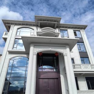 六安白麻别墅外墙干挂石材效果示例