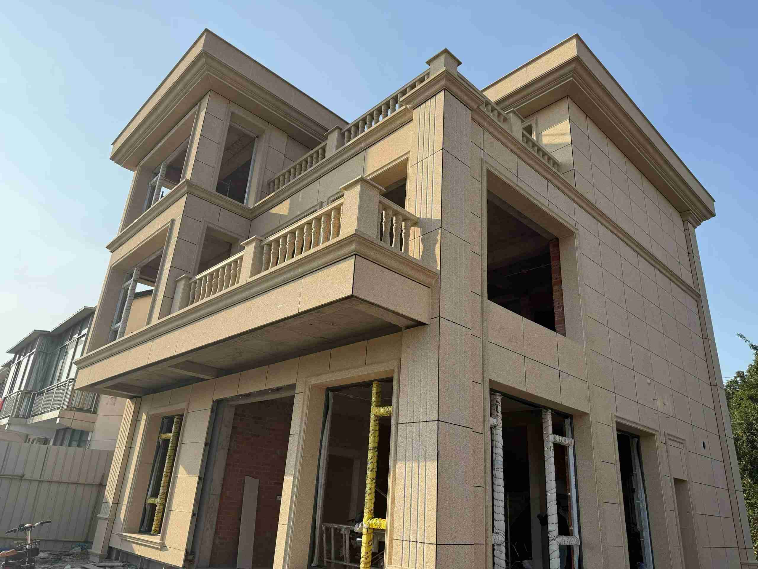 六安 黄金麻花岗岩石材荔枝面外墙干挂效果展示